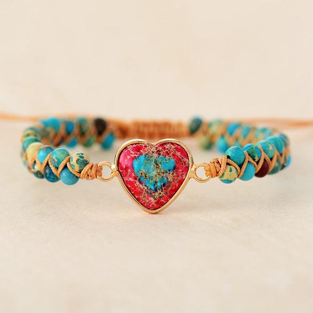 https://steffis-lebensenergie.shop/collections/armbander-1/products/red-emperor-stone-bracelet-peach-heart-love-bracelet-braided-bracelet