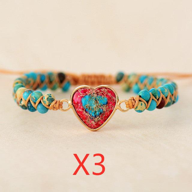 https://steffis-lebensenergie.shop/collections/armbander-1/products/red-emperor-stone-bracelet-peach-heart-love-bracelet-braided-bracelet