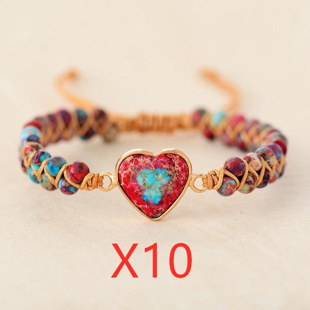 https://steffis-lebensenergie.shop/collections/armbander-1/products/red-emperor-stone-bracelet-peach-heart-love-bracelet-braided-bracelet